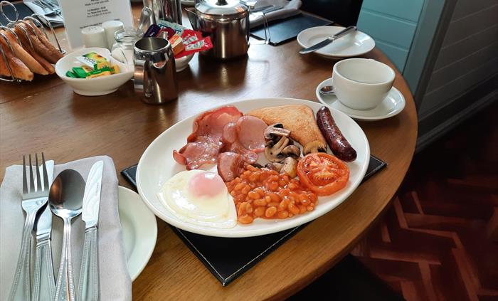 Full Welsh Breakfast, using local Sausages and Bacon and free range eggs.